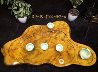 黄金樟茶盘满瘤疤 造型独特有档次